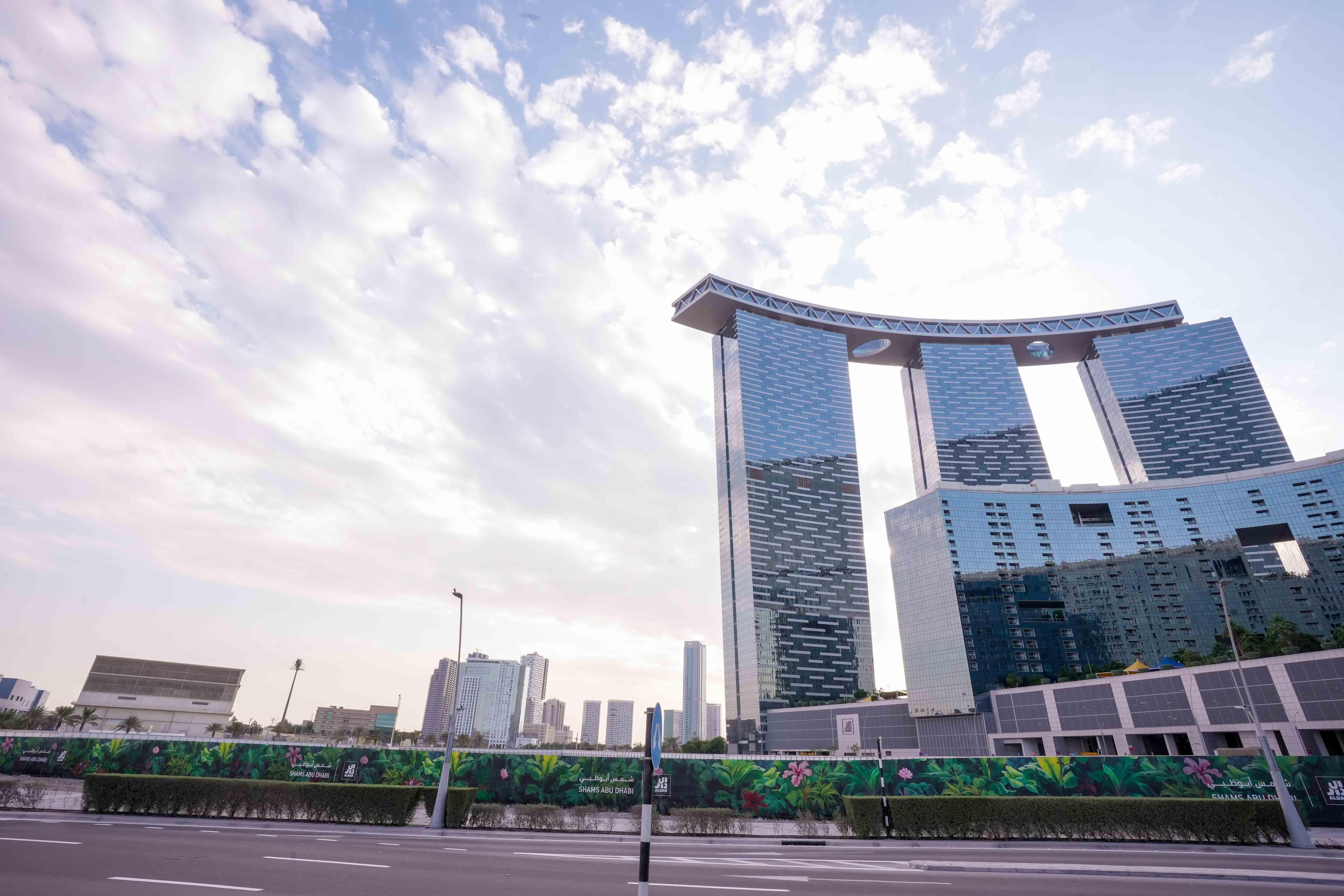 Landscaped gardens and shaded outdoor spaces on the podium level at Gate Tower Abu Dhabi highlighting community-focused living and modern convenience.